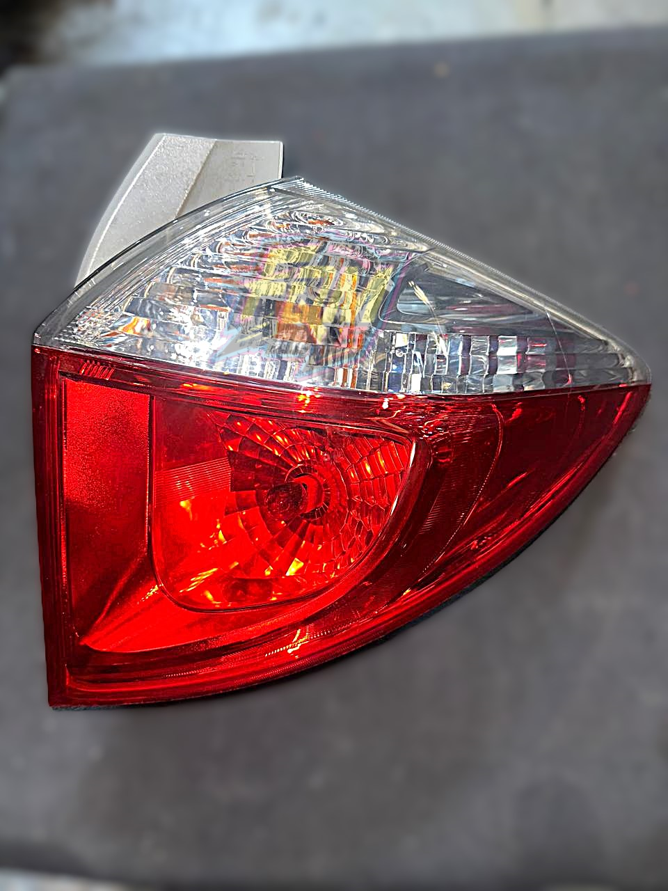 Faro Posterior Toyota Ractis